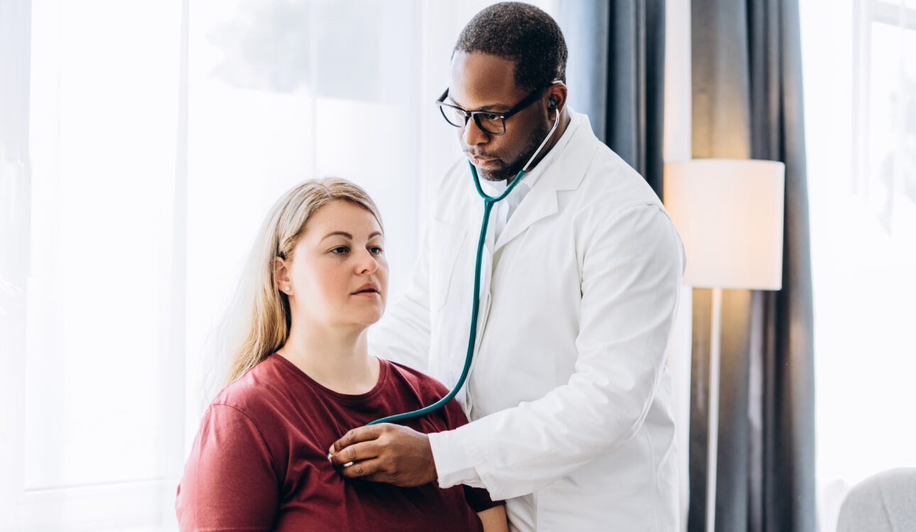 doctor checking patient for Cardiovascular and Pulmonary Testing