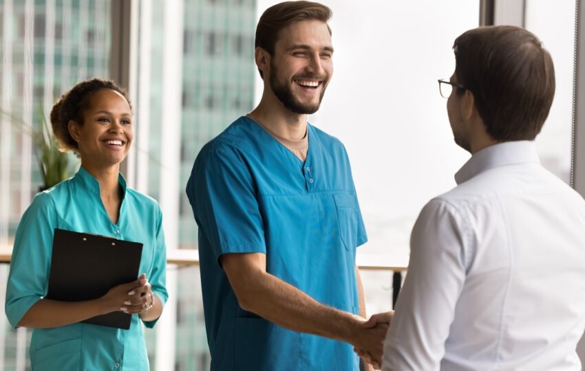 Healthcare provider explaining testosterone replacement therapy treatment process to male patient