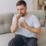 man experiencing early signs of lung disease