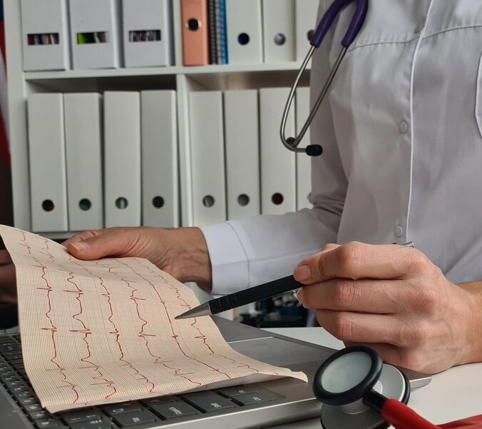Doctor reviewing EKG results during heart and lung testing in Paterson NJ
